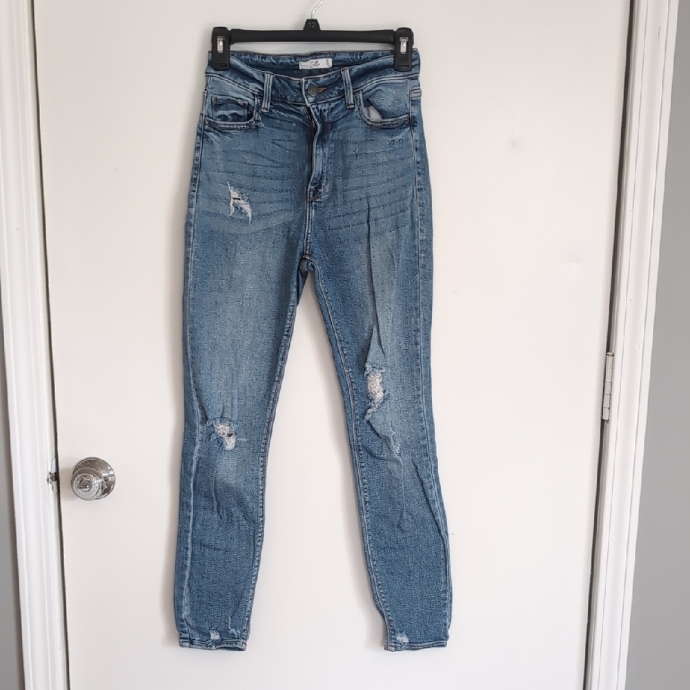 Blue Skinny Jeans with Distressed Details